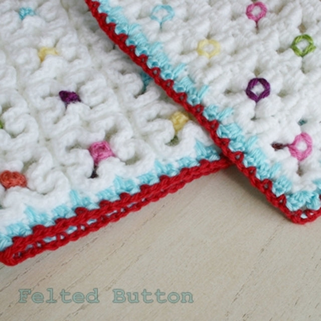 Crazy Good Mat and Blanket, colorful rainbow dots in center of wavy crochet flower grid, by Susan Carlson of Felted Button | Colorful Crochet Patterns
