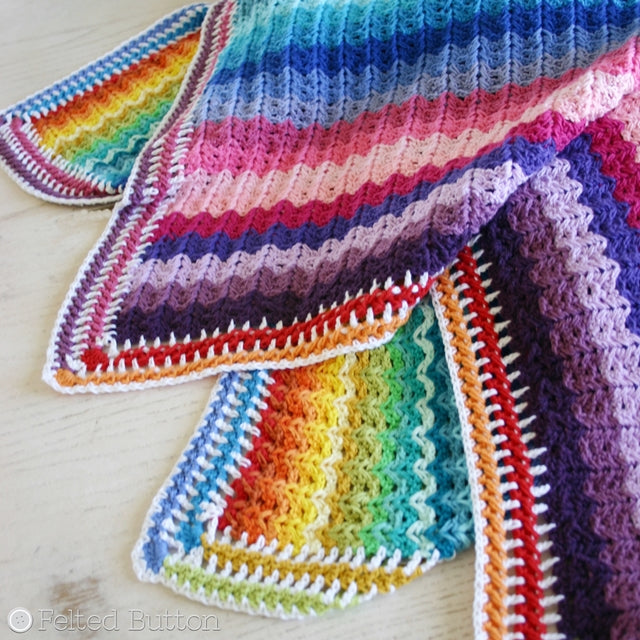 Rainbow striped and colorful textured crochet blanket, Illuminations Blanket free crochet pattern by Susan Carlson | Felted Button | Colorful Crochet Patterns