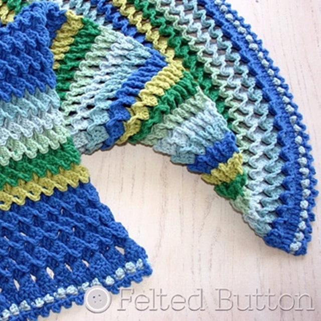 Blues and greens in textured and windowed crochet pattern, 3D, Irish Sea Blanket or crochet throw pattern by Susan Carlson of Felted Button | Colorful Crochet Patterns