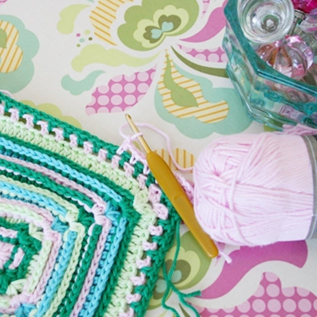 Breath of Heaven Blanket, Pink and green crochet square with pink yarn and crochet hook, Susan Carlson of Felted Button | Colorful Crochet Patterns