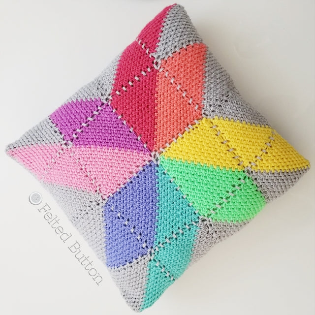 Prism Pillow | Crochet Pattern | Felted Button | rainbow of prism shaped squares crocheted on square pillow