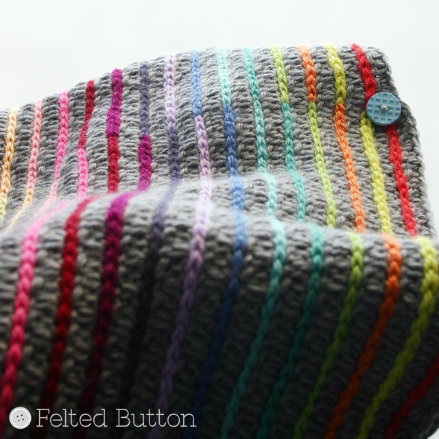 Rainbow surface crochet stripes on grey fabric, by Susan Carlson of Felted Button | Colorful Crochet Patterns