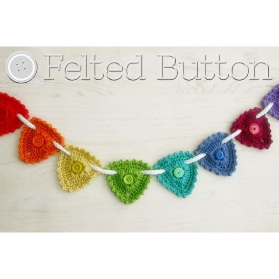 Button Garland, Bunting, or hanging triangle ornaments with a button center for decorating home or nursery, a free crochet pattern by Susan Carlson of Felted Button