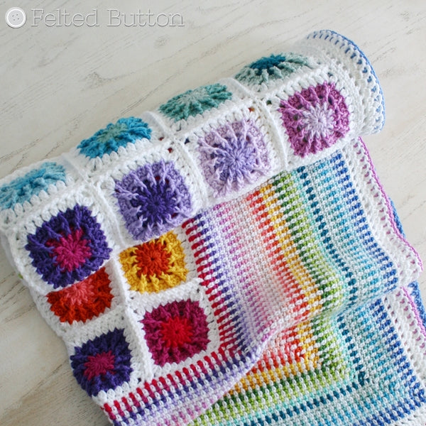 Rainbow colors of textured granny square motifs with colorful linen stitch border--Around the Corner Blanket crochet pattern by Susan Carlson of Felted Button