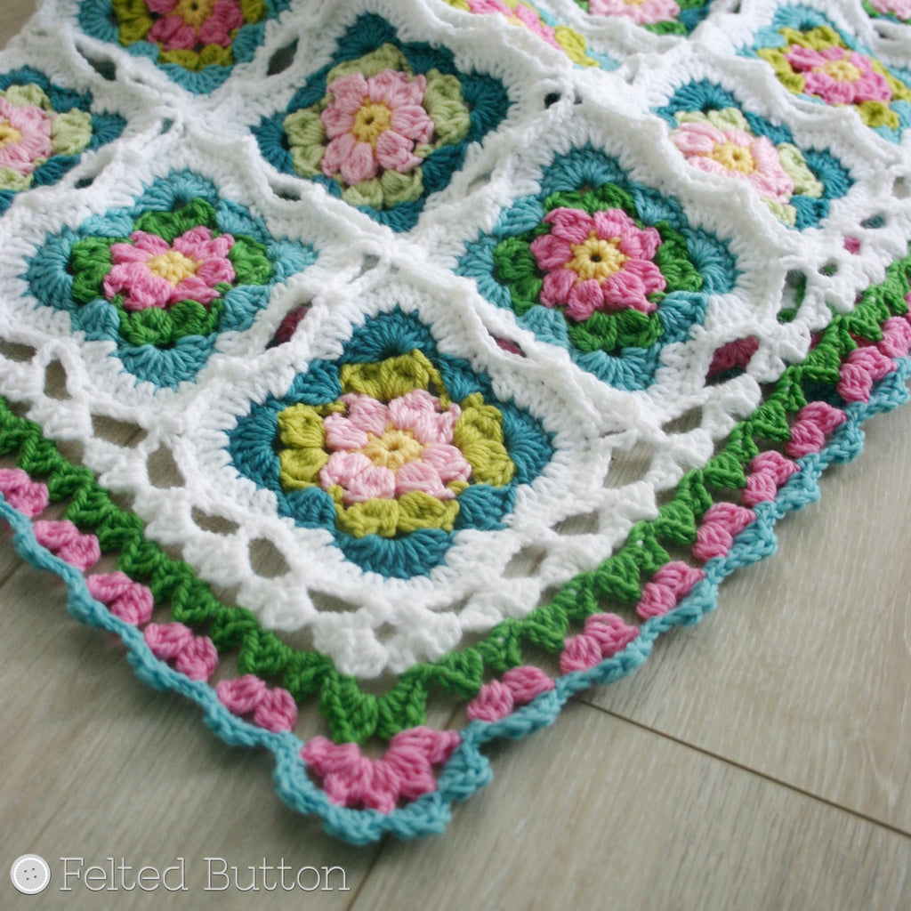 Vintage granny square blanket in turquoise pink and green, crochet pattern by Susan Carlson of Felted Button, colorful and textured crochet patterns