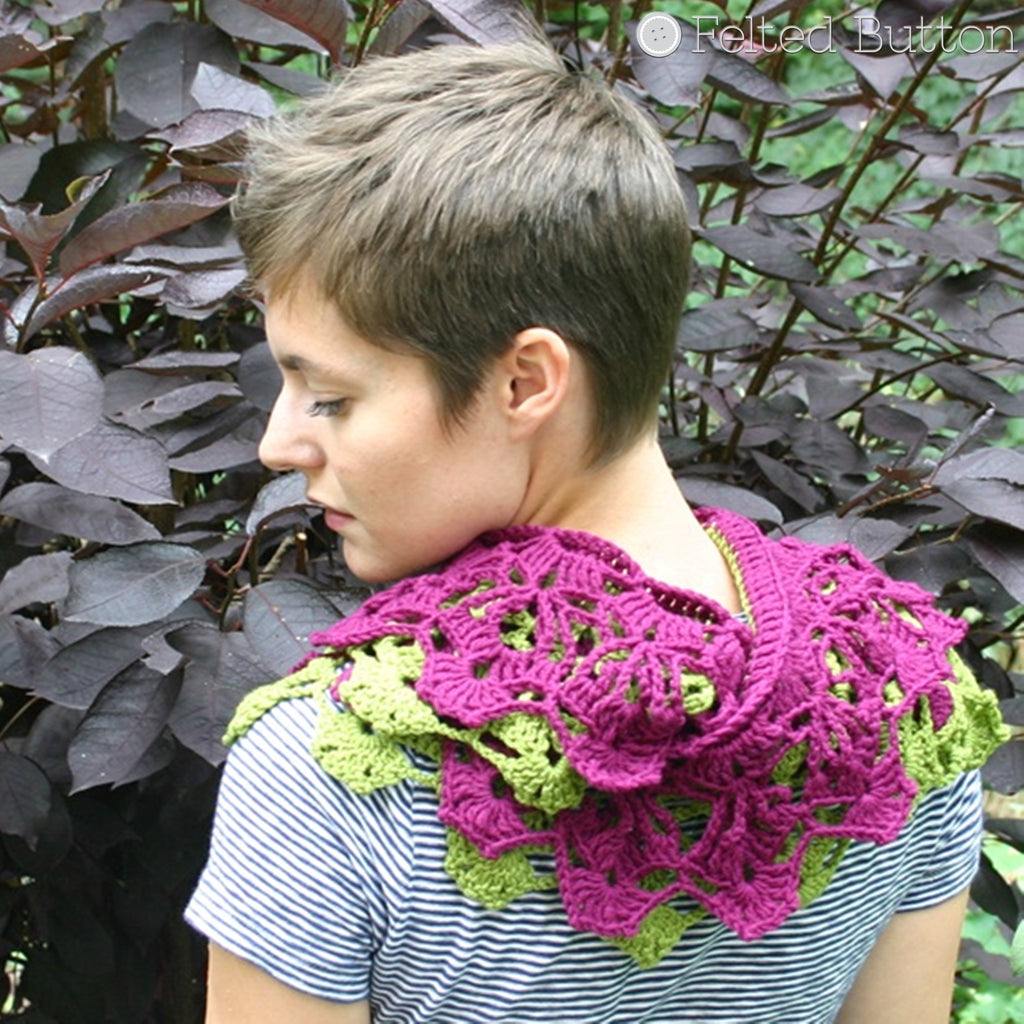 Pretty girl wearing fuschia and green lacy cowl scarf outside, Garden Terrace Scarf, crochet pattern by Susan Carlson of Felted Button