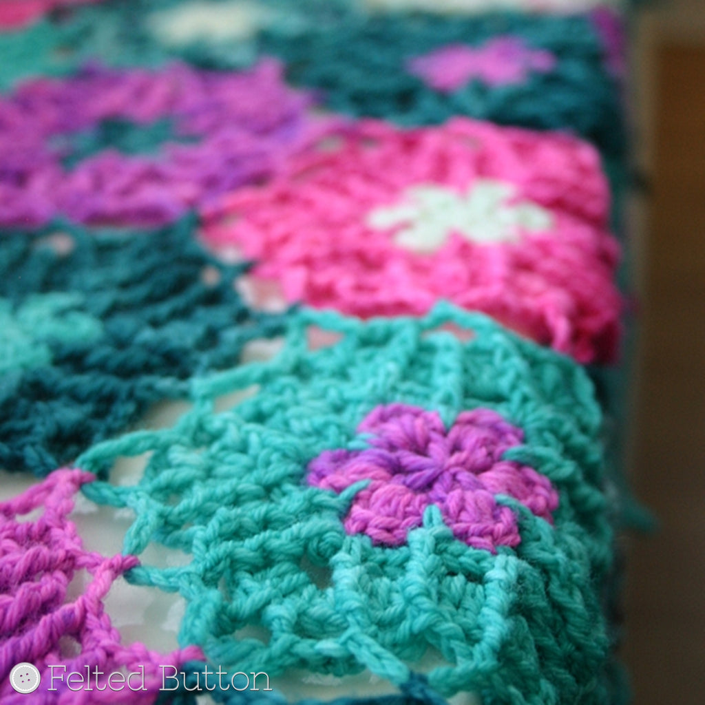 Pink and turquoise textured crochet wrap with tassels, Haarlem Wrap crochet pattern by Susan Carlson of Felted Button