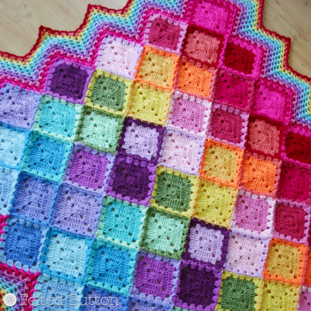 Happy Harlequin Blanket, free crochet pattern designed by Susan Carlson of Felted Button, made with Scheepjes Colour Crafter yarn, granny squares and colorful diamonds