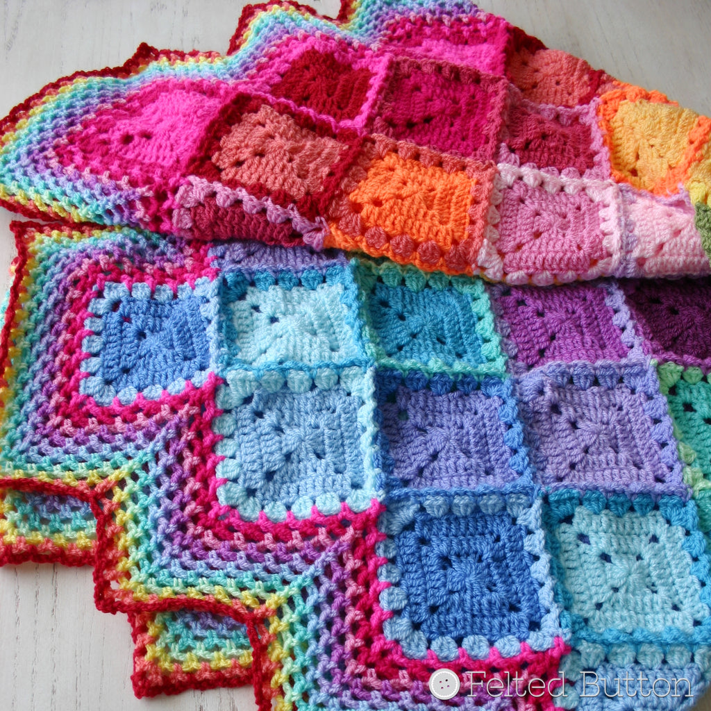 Happy Harlequin Blanket, free crochet pattern designed by Susan Carlson of Felted Button, made with Scheepjes Colour Crafter yarn, granny squares and colorful diamonds