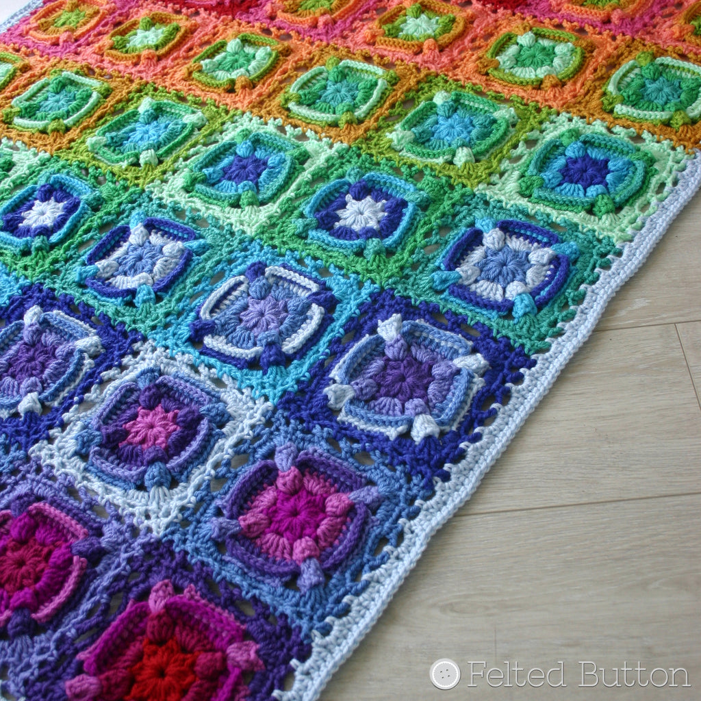 Rainbow textured granny square blanket or afghan, Kaleidoscope Eyes Blanket crochet pattern by Susan Carlson of Felted Button