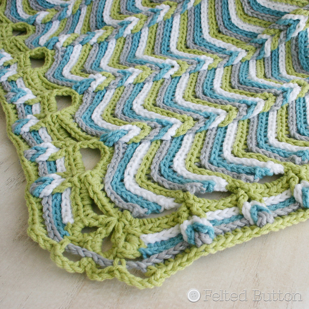 Modern ripple crochet baby blanket in blue, green and white, Rolling Ridge Blanket crochet pattern by Susan Carlson of Felted Button