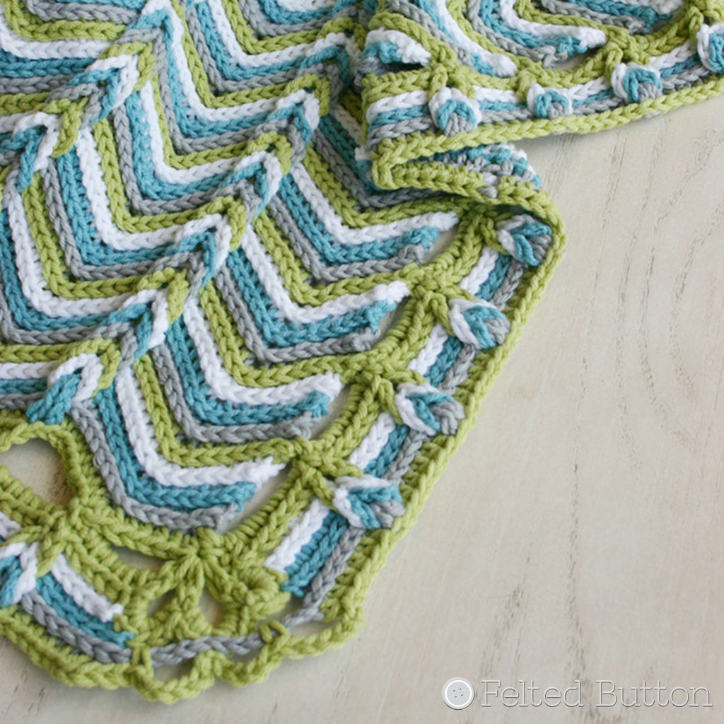 Modern ripple crochet baby blanket in blue, green and white, Rolling Ridge Blanket crochet pattern by Susan Carlson of Felted Button
