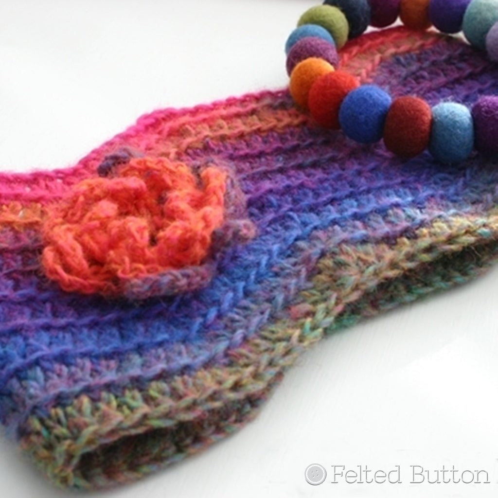 Bright rainbow ripple cowl with loopy textured crochet flower, Watercolor Waves Cowl free crochet pattern by Susan Carlson of Felted Button