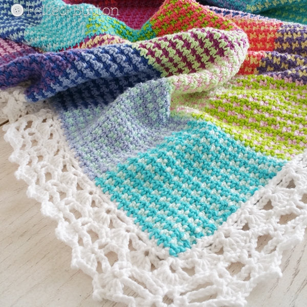 Rainbow patches crochet blanket with herringbone stitch and lace border, Washburn Blanket crochet afghan pattern by Susan Carlson of Felted Button