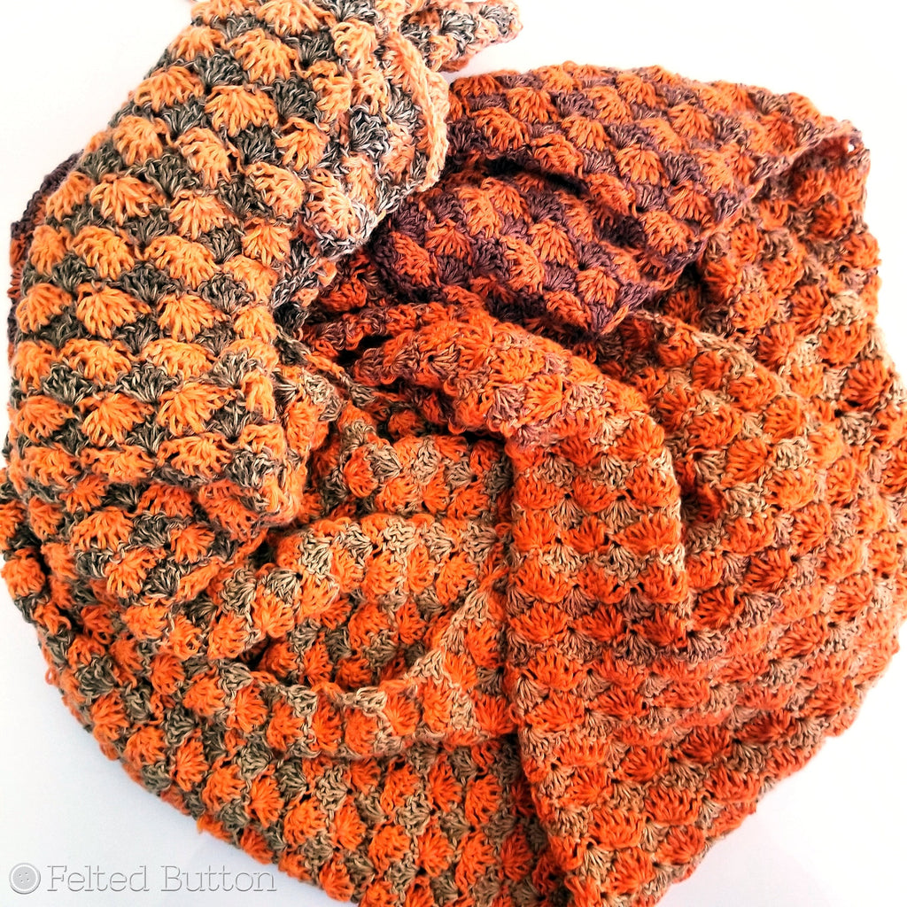 Orange and brown crochet shawl designed by Susan Carlson of Felted Button, Duo Shawl free crochet pattern