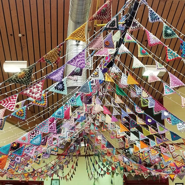 Bunting crochet flags at Yarndale in Skipton, colorful Garland triangles hanging 