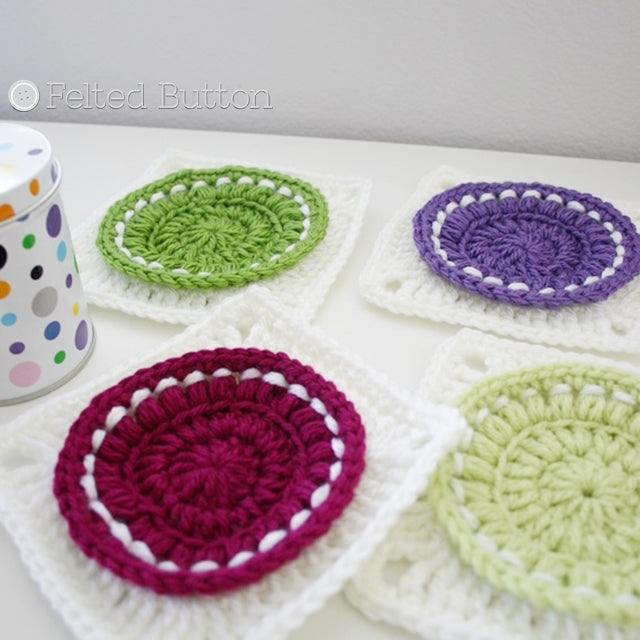 Large buttons in square crochet motifs in purple, blue and greens, Bright as a Button crochet pattern by Susan Carlson of Felted Button | Colorful Crochet Patterns