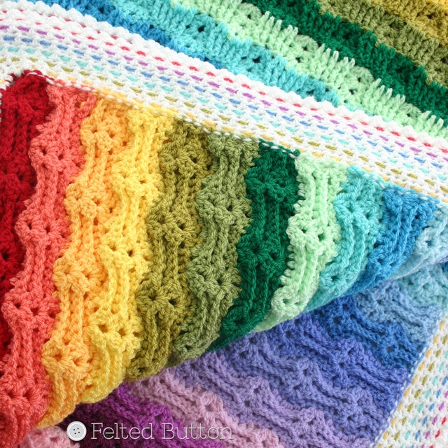Chasing Rainbows Baby Blanket or Throw, crochet afghan pattern of textured rainbow colored blanket by Susan Carlson of Felted Button | Colorful Crochet Patterns