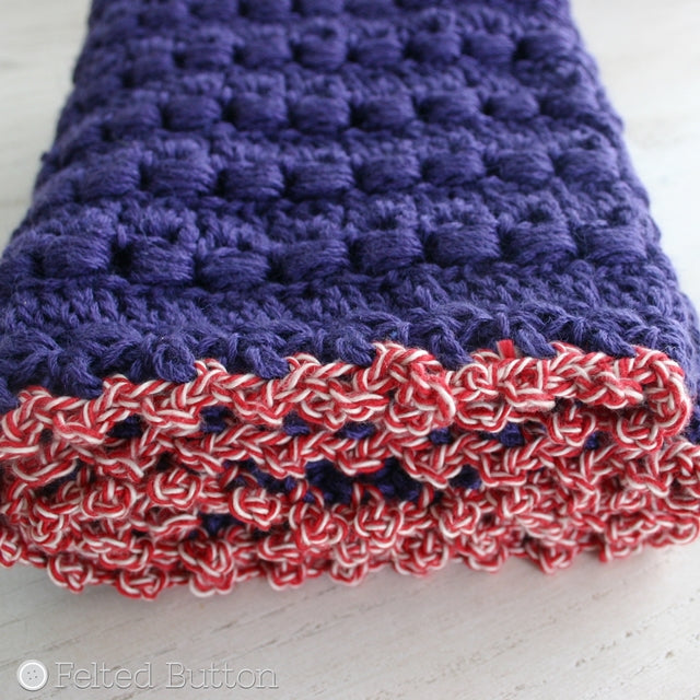 Purple textured crochet cowl with red border, Cwtch Cowl and Hood, crochet pattern by Susan Carlson of Felted Button | Colorful Crochet Patterns