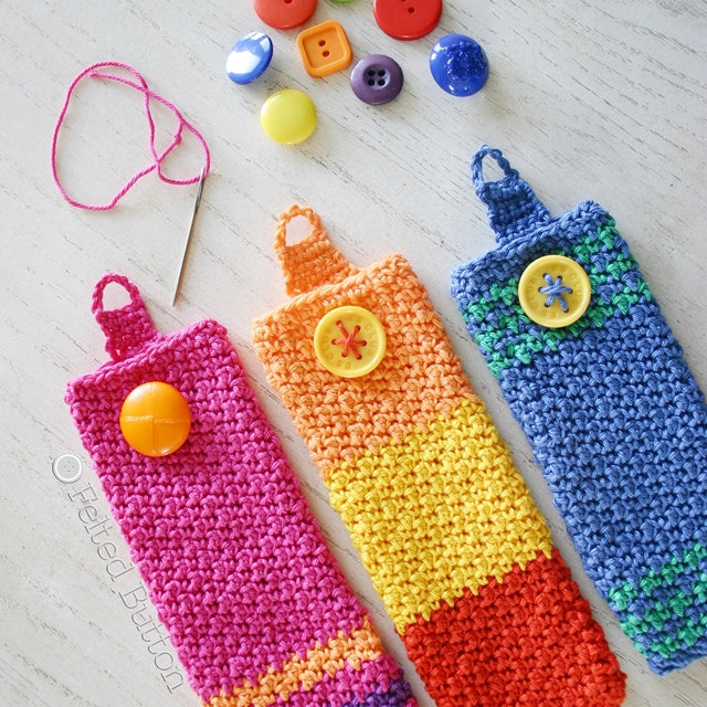Bright crochet colorful eyeglass pouches with button closures, free crochet pattern by Susan Carlson of Felted Button colorful crochet patterns 