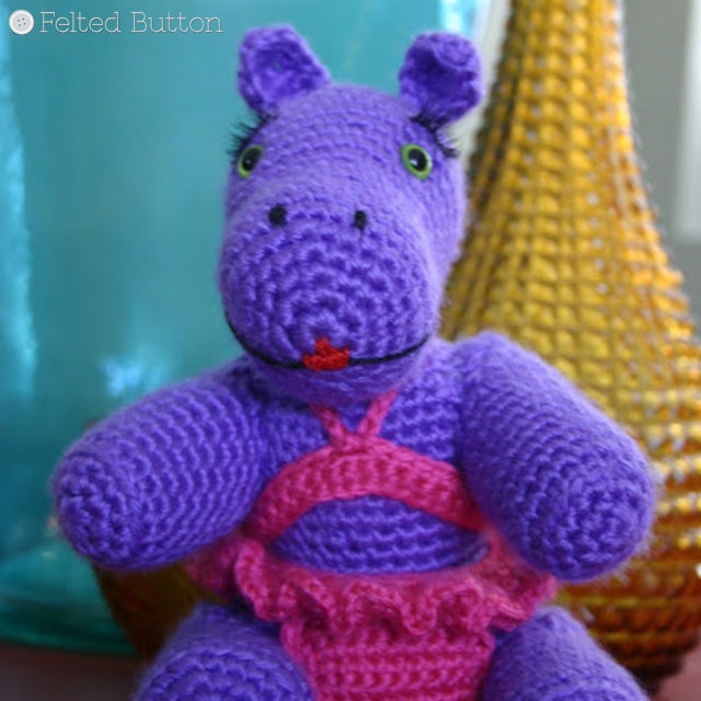 Hilda the Hippo, purple amigurumi crocheted hippo with eyelashes and pink ruffled bikini, Susan Carlson of Felted Button | Colorful Crochet Patterns