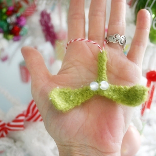 Christmas ornament, handmade felted mistletoes with white beads as berries, by Susan Carlson of Felted Button | Colorful Crochet Patterns