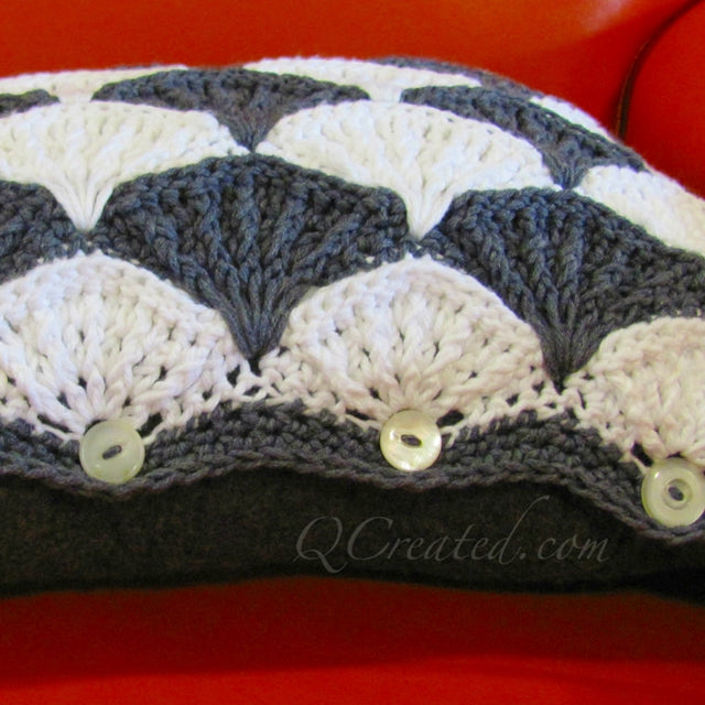 Black and white paintbrush crochet pattern on orange chair by Susan Carlson of Felted Button | Colorful Crochet Patterns