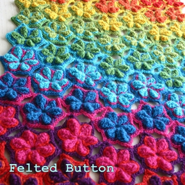Star Fruit Blanket and Rug in rainbow crochet, textured with star shaped flowers or hexagons, crochet pattern designed by Susan Carlson of Felted Button | Colorful Crochet Patterns