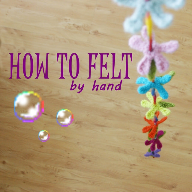 How to felt by hand, Wee Felted Blossoms hanging on string, hand-felted flowers in many colors, crochet tutorial or tip by Susan Carlson of Felted Button | Colorful Crochet Patterns