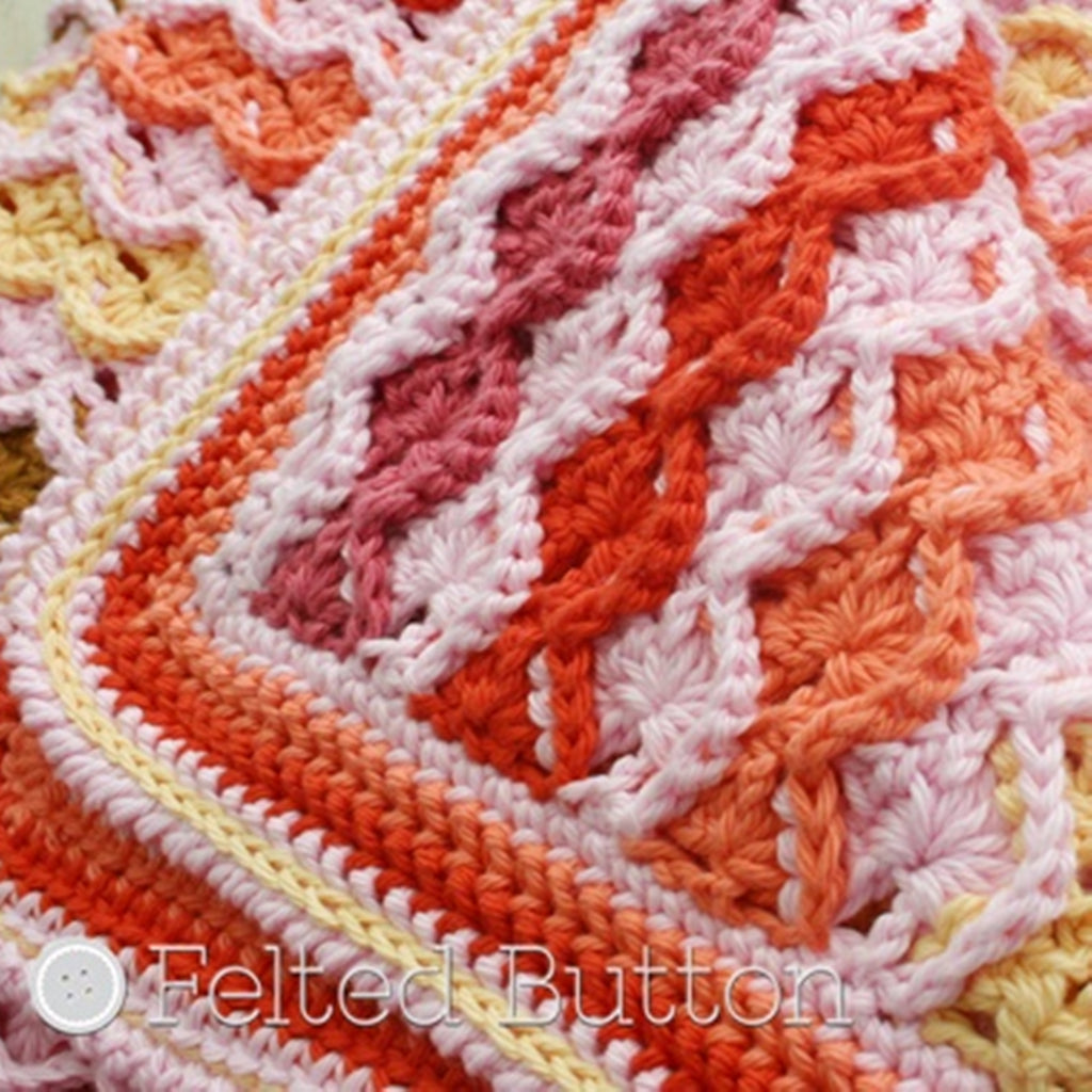 Pink and orange textured crochet blanket made with cotton yarn, designed by Susan Carlson of Felted Button, colorful crochet patterns
