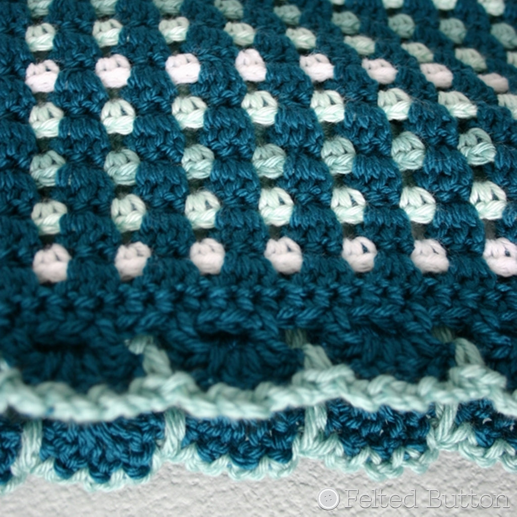 Teal and ombre color crochet blanket with scalloped edging, crochet pattern by Susan Carlson of Felted Button