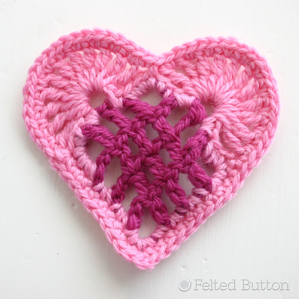 Pink crochet heart motifs with grid center, From the Heart Bunting, free crochet pattern by Susan Carlson of Felted Button