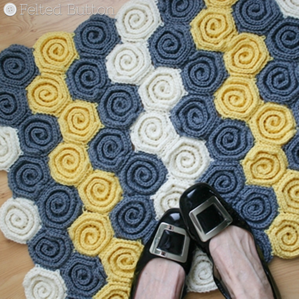 Gray, yellow and white swirls in ripple crochet rug, Let's Twirl Blanket and Rug by Susan Carlson of Felted Button