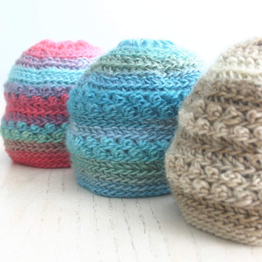 3 crochet baby hats in red/turquoise, turquoise/green and tan, Only Just Born Hat, crochet pattern for newborns by Susan Carlson of Felted Button