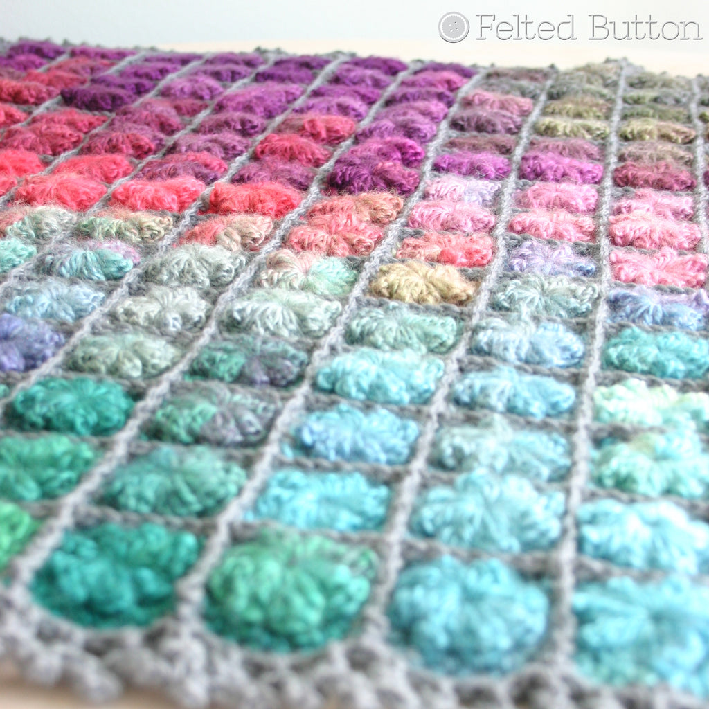 Small crochet flower motifs with rainbow watercolor effect, Painted Pixels Blanket for baby or afghan, colorful crochet pattern by Susan Carlson of Felted Button
