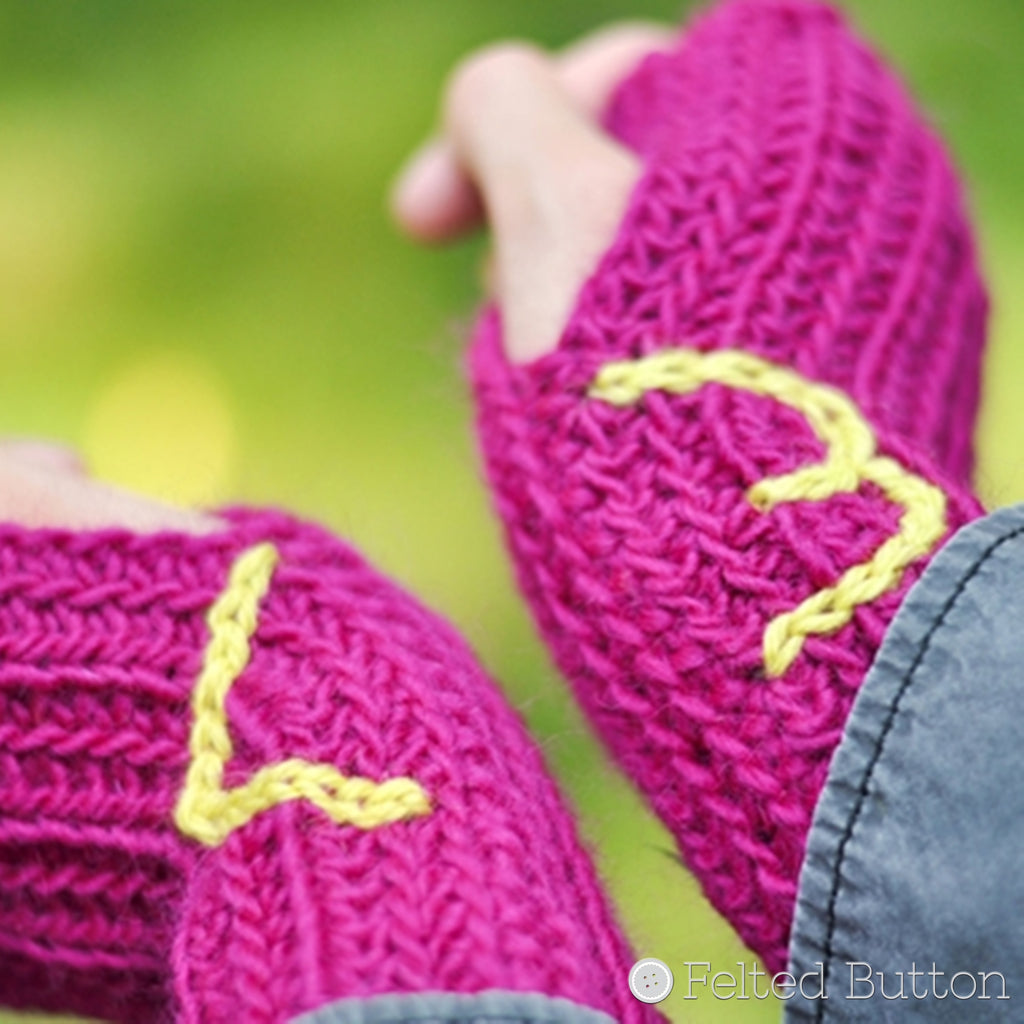 Ribbed Wrist Warmers crochet pattern by Susan Carlson of Felted Button hot pink with neon yellow <3