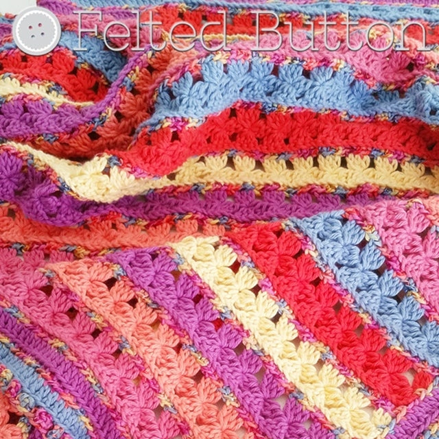 Pinks and oranges floral striped crochet blanket, Rows of Posies crochet afghan pattern by Susan Carlson of Felted Button