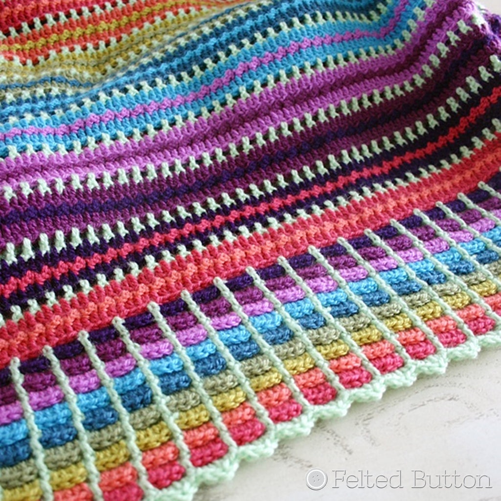 Striped crochet blanket in rainbow colors, Skittles Blanket crochet afghan throw pattern by Susan Carlson of Felted Button