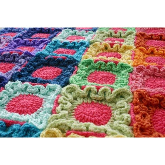 Rainbow colored textured granny square crochet blanket or afghan, Doodle Dots by Susan Carlson of Felted Button, colorful crochet patterns