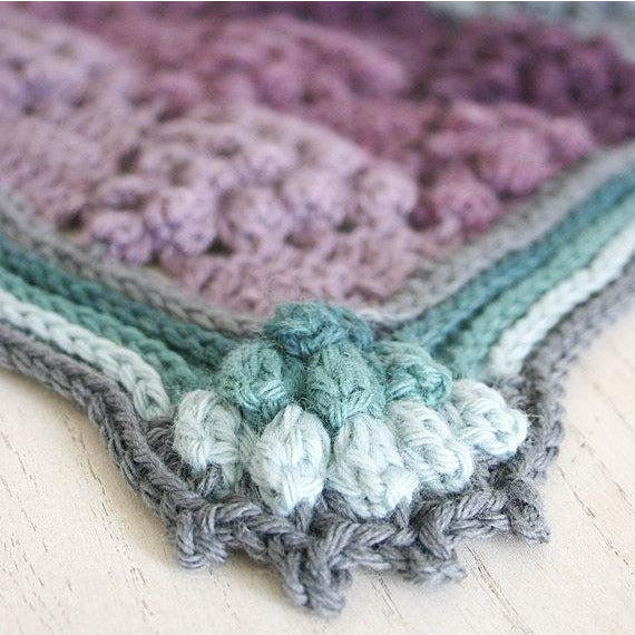 Purples and teals striped and textured blanket with "grapes", Vintage Vineyard Blanket crochet afghan by Susan Carlson of Felted Button, corner detail close-up